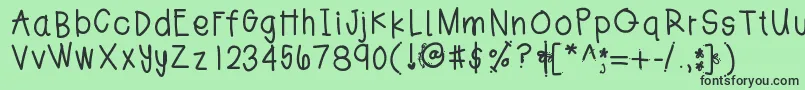 フォントJesshand – 緑の背景に黒い文字