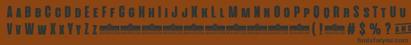 AlienscowsHeavyTrial Font – Black Fonts on Brown Background