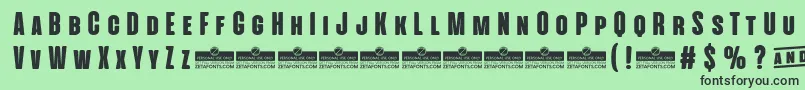 AlienscowsHeavyTrial Font – Black Fonts on Green Background