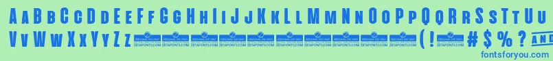 AlienscowsHeavyTrial Font – Blue Fonts on Green Background