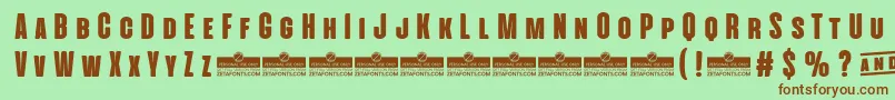 AlienscowsHeavyTrial Font – Brown Fonts on Green Background