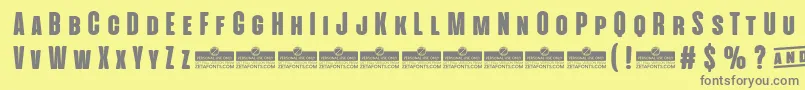 AlienscowsHeavyTrial Font – Gray Fonts on Yellow Background