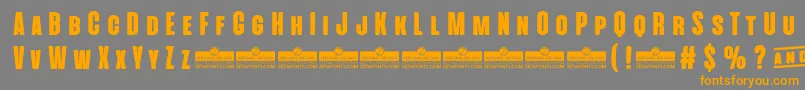 AlienscowsHeavyTrial Font – Orange Fonts on Gray Background