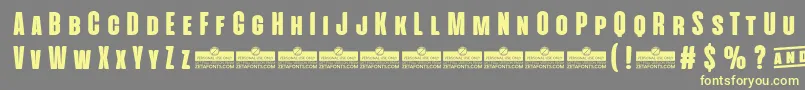 AlienscowsHeavyTrial Font – Yellow Fonts on Gray Background