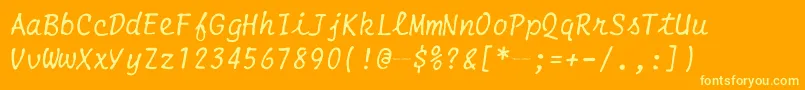 SmithCoronaEc1100Script-fontti – keltaiset fontit oranssilla taustalla