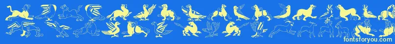 InvasionLtAnimals Font – Yellow Fonts on Blue Background
