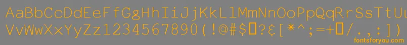 フォントEmlatin6 – オレンジの文字は灰色の背景にあります。