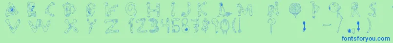 Tipografia.Zombie.-Schriftart – Blaue Schriften auf grünem Hintergrund