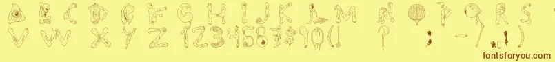 フォントTipografia.Zombie. – 茶色の文字が黄色の背景にあります。