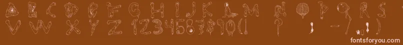 Tipografia.Zombie. Font – Pink Fonts on Brown Background