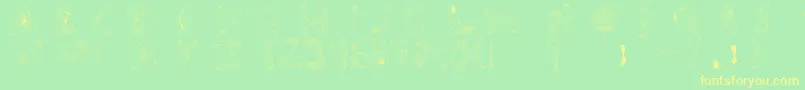 Tipografia.Zombie.-Schriftart – Gelbe Schriften auf grünem Hintergrund