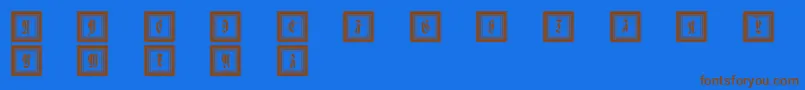 Framedfraxcaps Font – Brown Fonts on Blue Background