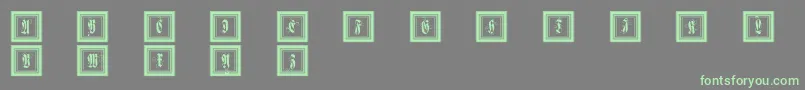 Framedfraxcaps Font – Green Fonts on Gray Background
