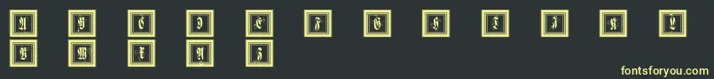 フォントFramedfraxcaps – 黒い背景に黄色の文字