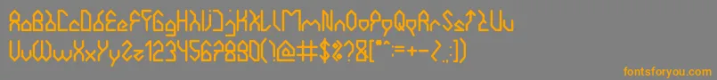 フォントHouseBuilder – オレンジの文字は灰色の背景にあります。