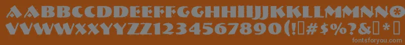 Nervouzr-Schriftart – Graue Schriften auf braunem Hintergrund