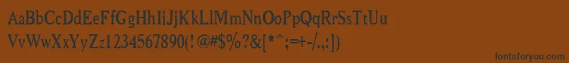 フォントNiewcmn – 黒い文字が茶色の背景にあります