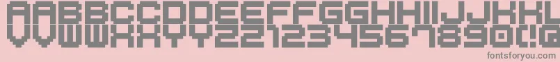 M41-fontti – harmaat kirjasimet vaaleanpunaisella taustalla