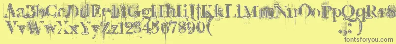 Шрифт Retrorockposter – серые шрифты на жёлтом фоне