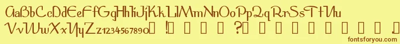 フォントSpirit – 茶色の文字が黄色の背景にあります。