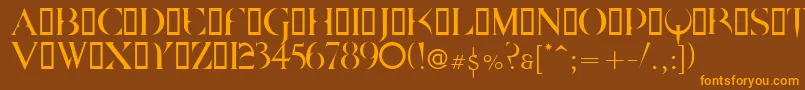 フォントQuake ffy – オレンジ色の文字が茶色の背景にあります。
