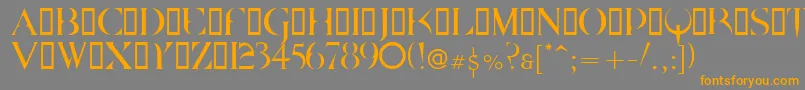 フォントQuake ffy – オレンジの文字は灰色の背景にあります。