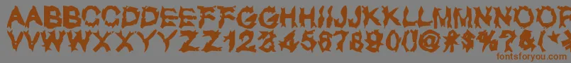 Подробнее о шрифте UglyLover Шрифт UglyLover – коричневые шрифты на сером фоне