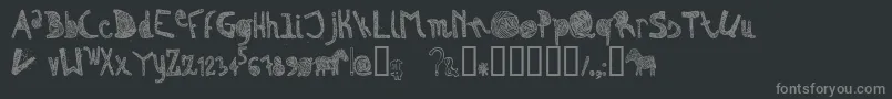 ZebraIrregular-fontti – harmaat kirjasimet mustalla taustalla