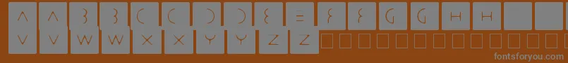 Шрифт Stbast – серые шрифты на коричневом фоне
