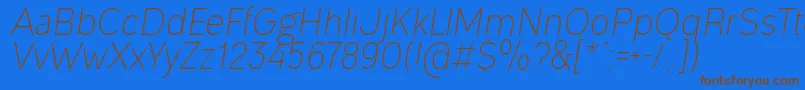 フォントOgonekLightItalic – 茶色の文字が青い背景にあります。