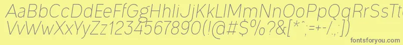 フォントOgonekLightItalic – 黄色の背景に灰色の文字