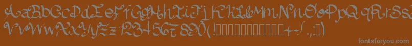 Lazydog-fontti – harmaat kirjasimet ruskealla taustalla