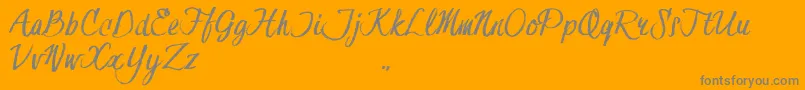 HessterMoffettTrial-Schriftart – Graue Schriften auf orangefarbenem Hintergrund