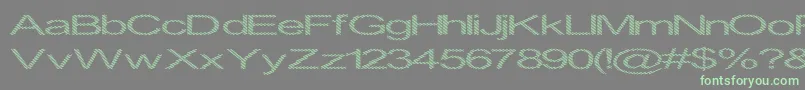 Inningha-Schriftart – Grüne Schriften auf grauem Hintergrund