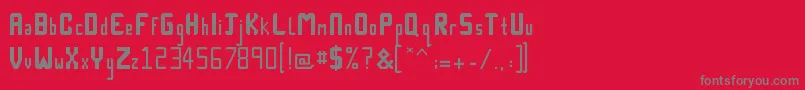 Technick-fontti – harmaat kirjasimet punaisella taustalla
