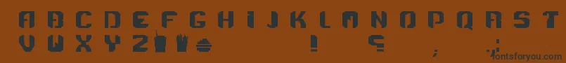 Czcionka Menace – czarne czcionki na brązowym tle