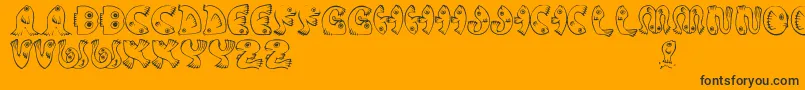 JmhPez-Schriftart – Schwarze Schriften auf orangefarbenem Hintergrund