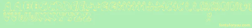 JmhPez Font – Yellow Fonts on Green Background