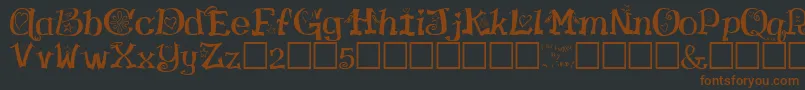 Fonte VirginRegular – fontes marrons em um fundo preto