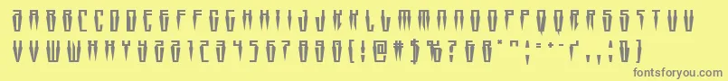 Czcionka Swordtoothtitle – szare czcionki na żółtym tle