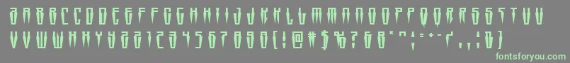 Więcej informacji o czcionce Swordtoothtitle Czcionka Swordtoothtitle – zielone czcionki na szarym tle