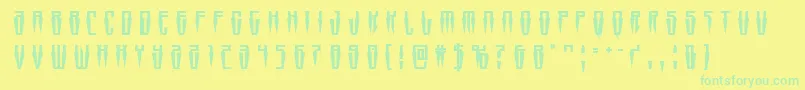 fuente Swordtoothtitle – Fuentes Verdes Sobre Fondo Amarillo