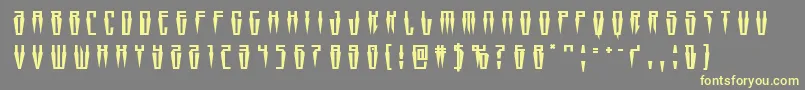 Swordtoothtitle-Schriftart – Gelbe Schriften auf grauem Hintergrund