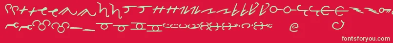 ThorassFrFont-Schriftart – Grüne Schriften auf rotem Hintergrund