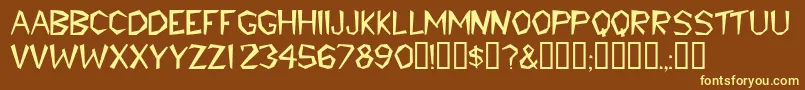 Tribaldisplaycapsssk Font – Yellow Fonts on Brown Background