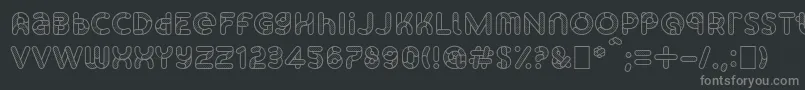 SkrovapartsOutlinedotted1-fontti – harmaat kirjasimet mustalla taustalla