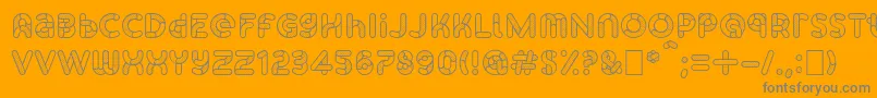 Czcionka SkrovapartsOutlinedotted1 – szare czcionki na pomarańczowym tle