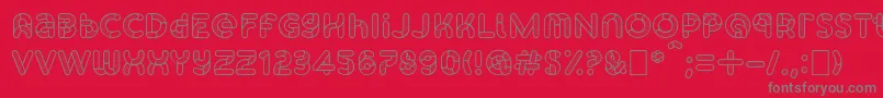 Czcionka SkrovapartsOutlinedotted1 – szare czcionki na czerwonym tle