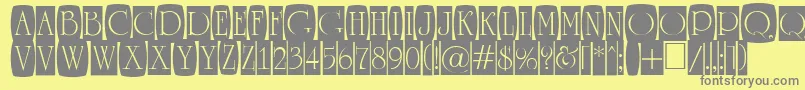 ARomanusttlcmd2cb Font – Gray Fonts on Yellow Background