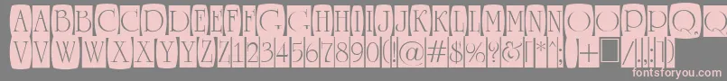 ARomanusttlcmd2cb-Schriftart – Rosa Schriften auf grauem Hintergrund